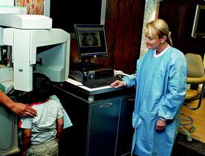 It gets better: Dr. Denise Habjan leans in to comfort an unhappy 5-year-old Valentin Ramirez for dental treatment in one of Tomorrow