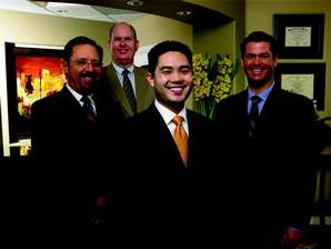 Left to right: Rich Koffron, Field Sales Consultant; Mike Dukes, Equipment Sales Specialist; Dr. Samual Ip; Russ Baker, Zone Manager