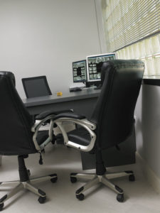 A private consultation room, bright and modern, gives patients a comfortable place to discuss their treatment options.