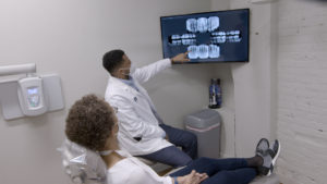 Dr. Wood reviews intraoral scans with his patients to determine the right treatment plans for them.