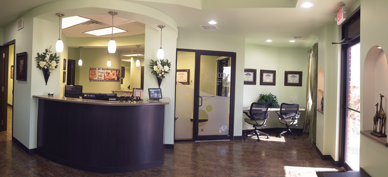 A picture of serenity, the reception area features soft wall colors, wall niches, and rich window treatments designed to soften the office’s clinical feel and relax patients when they arrive.