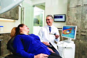 Dr. Lamas scanning a patient.