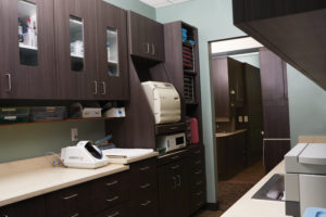 The large galley-style sterilization room utilizes cutting-edge equipment from Midmark as staff move instruments from dirty to clean.