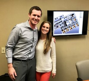 Ben Oliver, Henry Schein Equipment Sales Specialist (left), meets with one of his customers to plan out her dental office design.