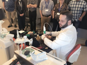 A training session using a Planmeca Emerald intraoral scanner in the Richardson, Texas facility.