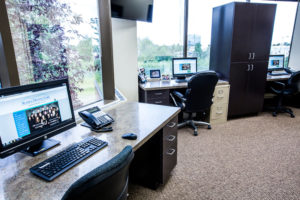 The doctors’ private office is serene, with large windows overlooking the outdoors. It was originally designed as a larger space, but the doctor revised the plans to allot more square footage to the employee lounge instead.