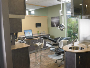 Each of the seven operatories is identically designed with Pelton & Crane chairs and cabinetry from their Renaissance line. Patients enjoy the chair’s massage feature and seeing the outdoor beauty right outside the large windows.