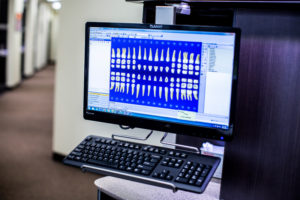 Dentrix practice management system screenshot on computer