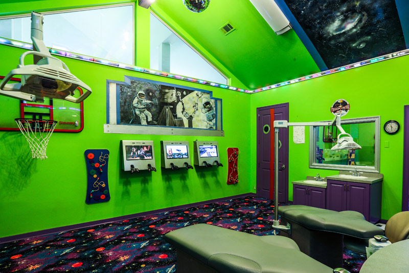 The pediatric room is a favorite in the offce, featuring three video game consoles and even an indoor basketball hoop where kids can practice their dunk.