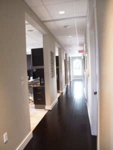 The six operatories are on one side of the treatment area within steps of one another and across the hall from the sterilization room, onsite lab, and the panoramic X-ray alcove.