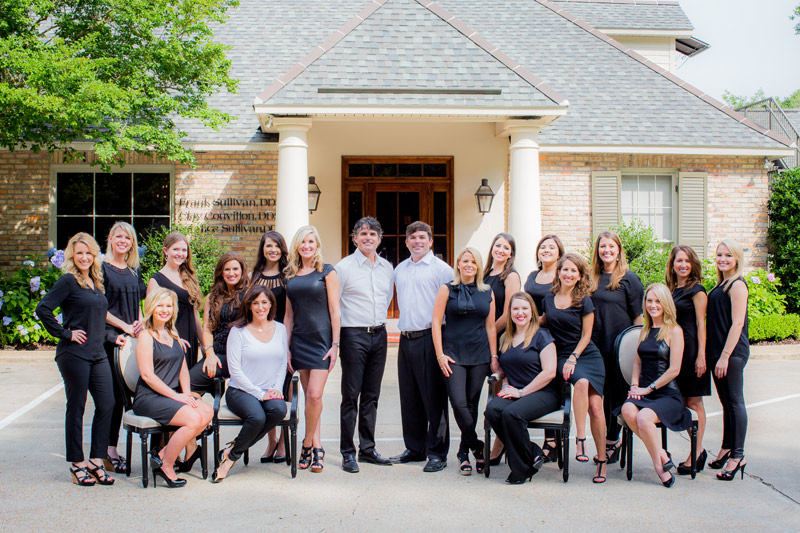 Dr. Frank Sullivan, Dr. Candice Sullivan, Dr. Clay Couvillon, and Staff