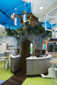 Large tree in the hygiene bay displaying X-ray images on monitors.