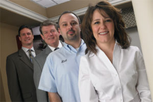 Back left: Brian Nolan, Equipment Sales Specialist; Wade Hinds, Field Sales Consultant; Rob Brenneman, Equipment Service Technician and Dr. Juliann Demand-Balski.